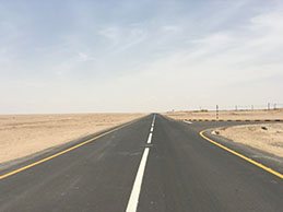 Completed road stretching into the desert